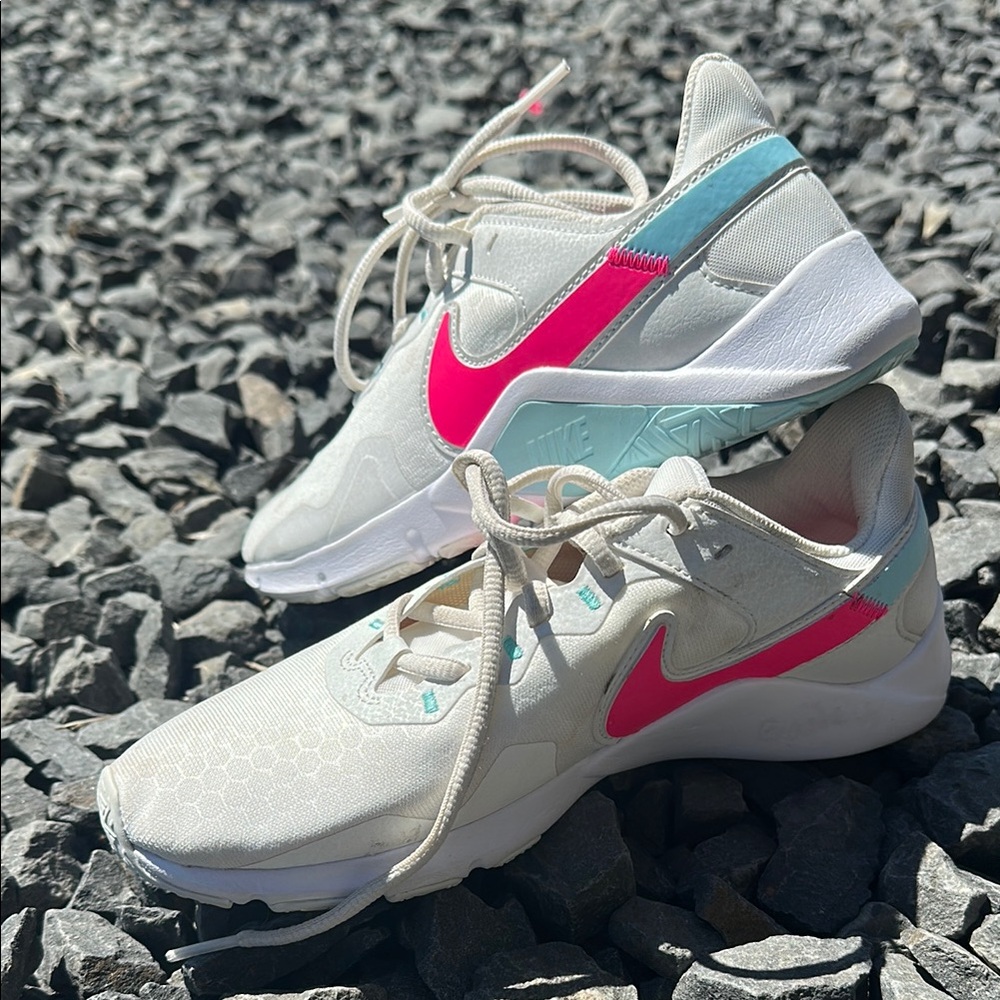 Nike White and Pink Sneakers with Modern Silhouette